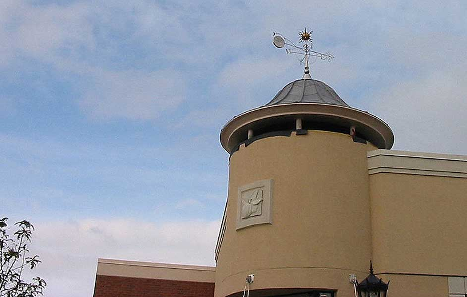 Hand crafted aluminum dome with curved standing seem roof