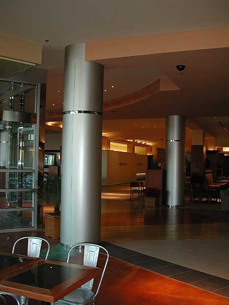 Decorative metal stainless steel column covers with polished mirror finish reveals