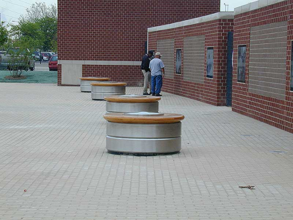 Stainless steel round bench made from 1 inch thick rolled plate to simulate auto wheel at Ford Motor Company Detroit, MI