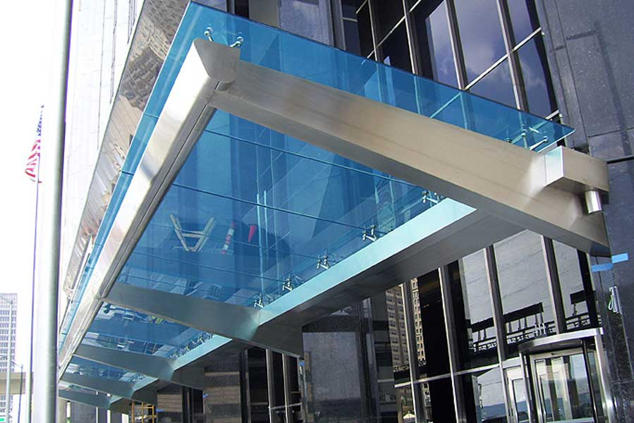 Large Stainless steel canopy with colored laminated safety glass at Comerica Bank, on Woodward Ave Detroit, MI