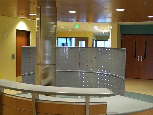 Stainless steel column cover with reveals