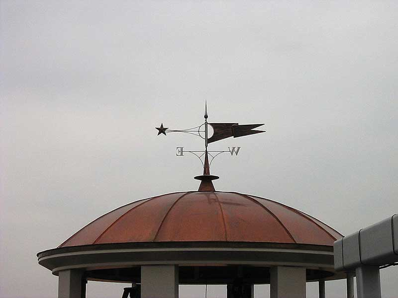 Beautiful decorative metal copper dome with weather vane at Village of Rochester Hills shopping center