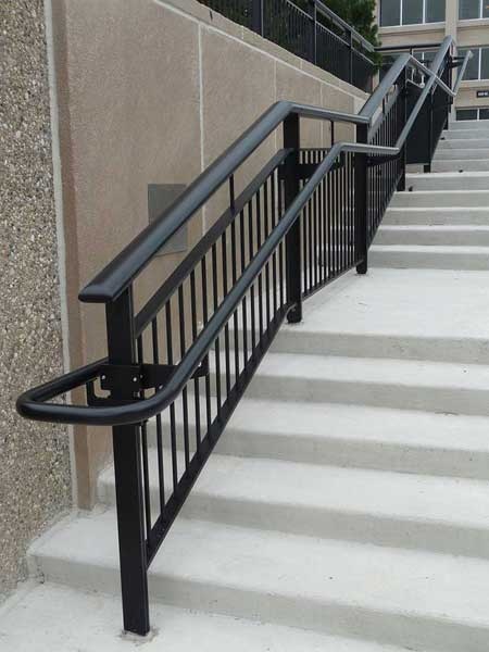 The signature Oval Top Rail gave this custom railing system the Ovation name.