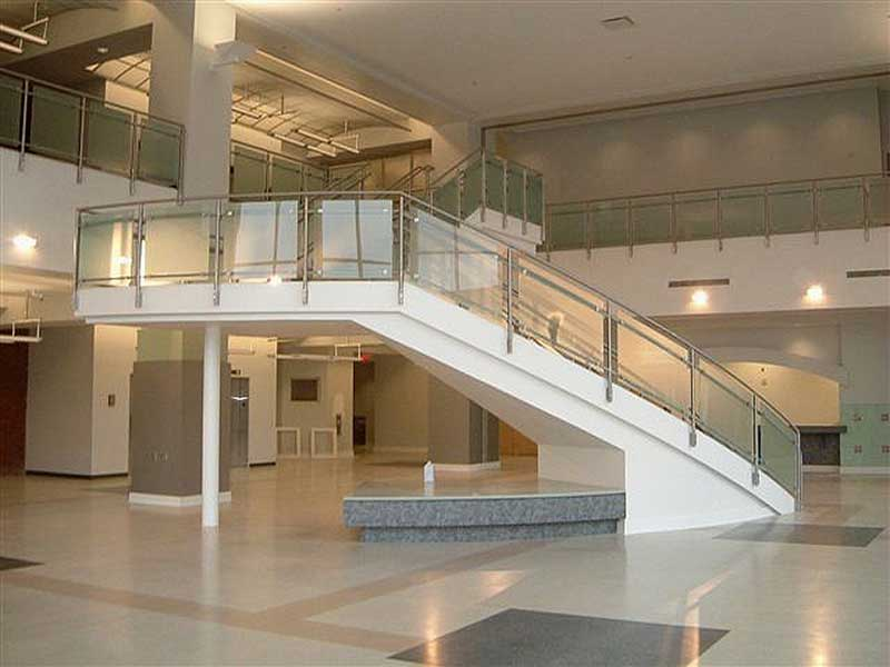Custom fabricated staircase with stainless steel and glass railings