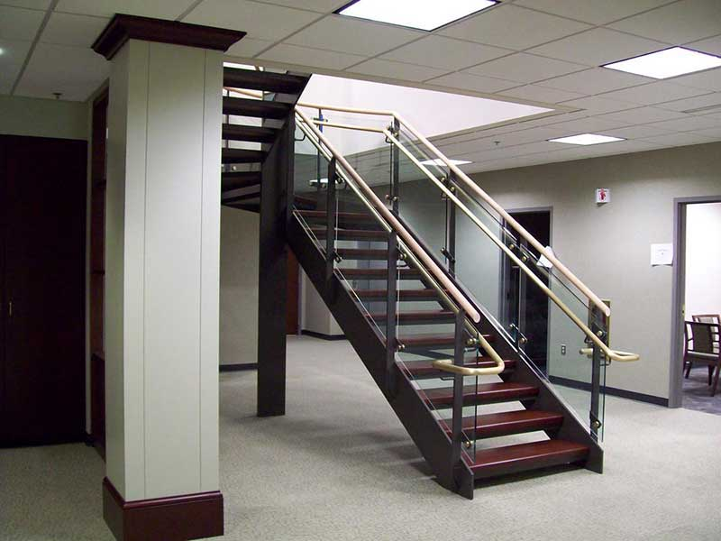 Bottom flight of stairway, showing the openness of the design.