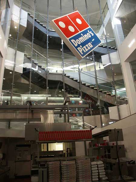 Decorative curved staircase at Domino's Pizza headquarters.