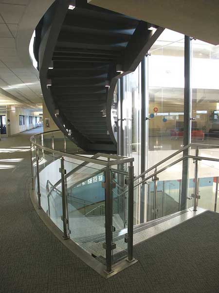 Multi flight spiral stair with cantilevered treads.
