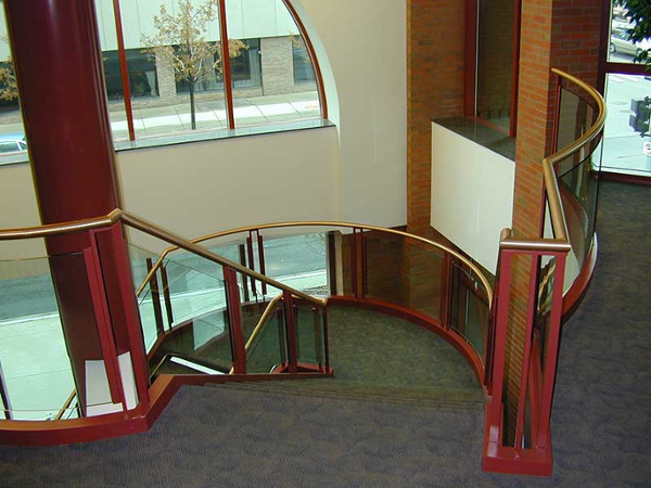 Ornamental stairway with curved landings.