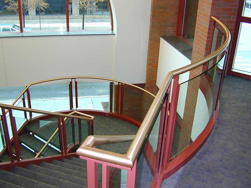 View at top balcony looking down the staircase.