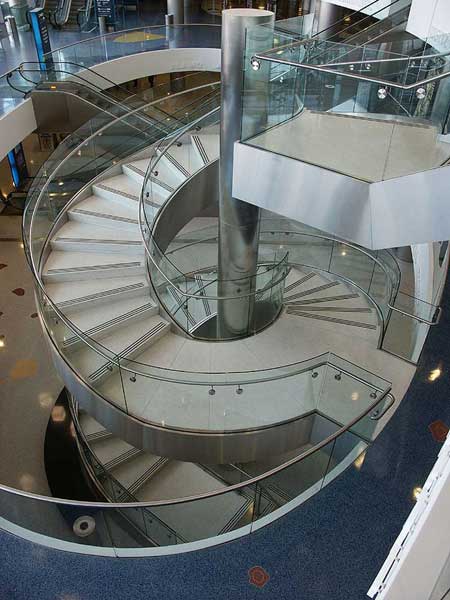 The architectual design of this stairway makes it a true focal point of the entry area.