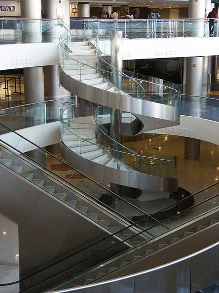 Glass railings and stainless steel curved stairway.