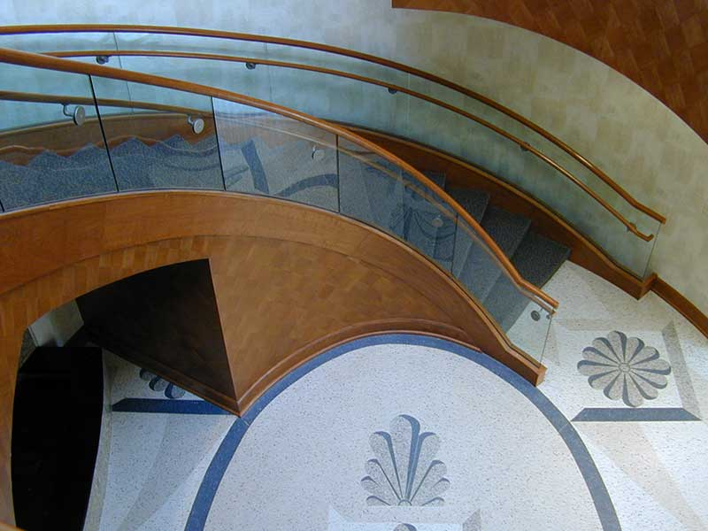Decorative stairway with custom floor tile